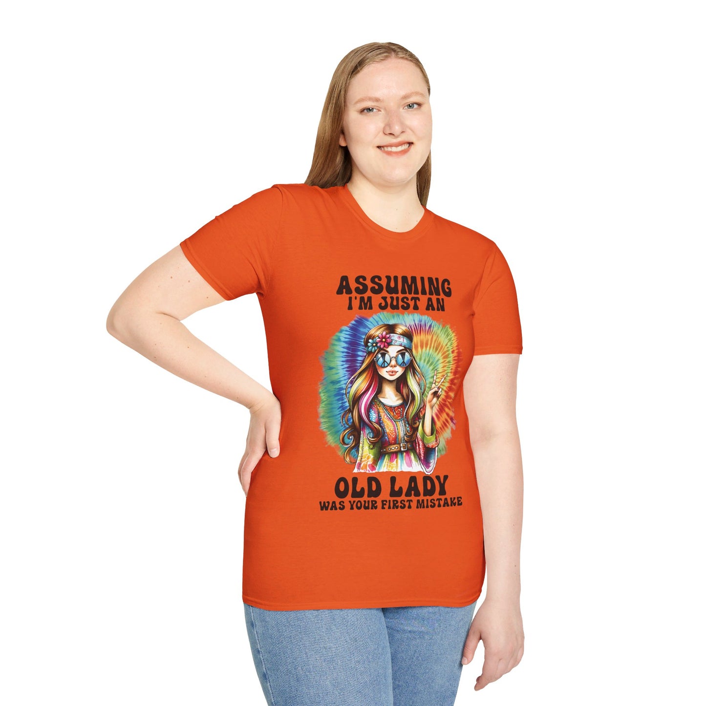 ASSUMING I'M JUST AN OLD LADY WAS YOUR FIRST MISTAKE. HIPPIE HUMOR. Cotton, Short Sleeve, Crew Neck Tee.