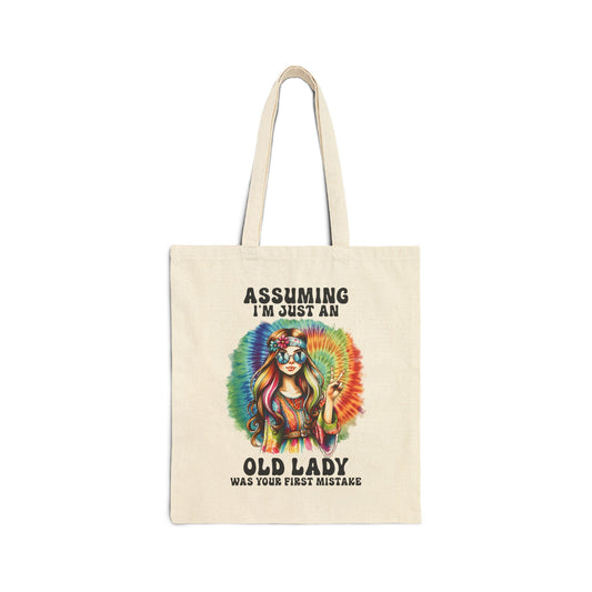 ASSUMING I'M JUST AN OLD LADY WAS YOUR FIRST MISTAKE. HIPPIE HUMOR. Cotton Canvas Tote Bag in Natural.